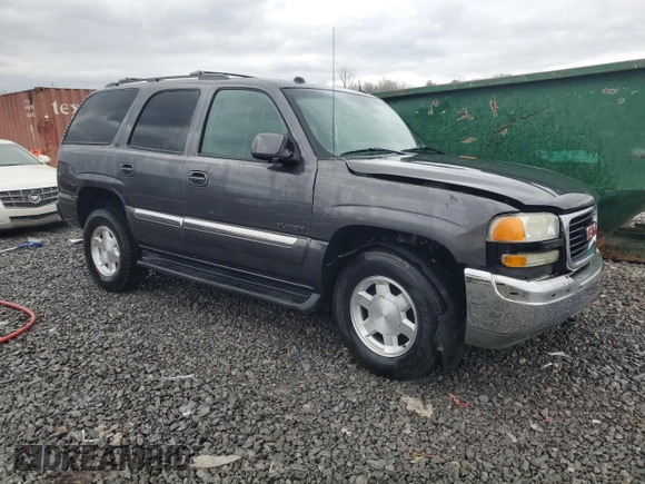 2005 GMC Yukon SLT z VIN 1GKEC13T35J119126, wystawiony jako Copart lot #47849455 z przebiegiem 301 785 mil mil oraz Szkoda całkowita • Salvage title. Historia ofert i sprzedaży dostępna na DreamBid. Obrazek 4.