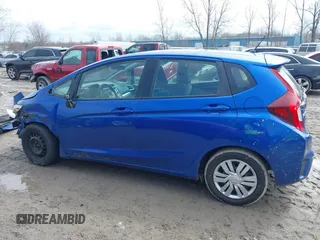 2015 Honda Fit LX with VIN 3HGGK5H52FM710434, listed as a IAAI auction lot 42022022 with 104,118 mi miles. Bid and sale history available at carsss.com. Image 15.