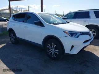 2018 Toyota RAV4 LE with VIN 2T3ZFREV8JW467744, listed as a IAAI auction lot 41818614 with 95,609 mi miles. Bid and sale history available at carsss.com. Image 1.