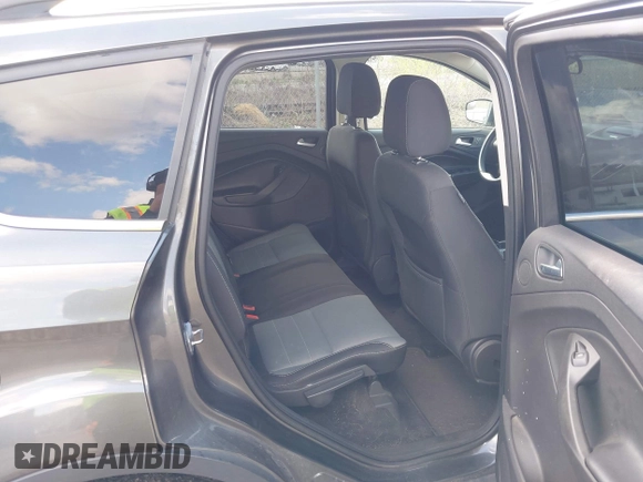 2016 Ford Escape SE with VIN 1FMCU9GX5GUA06660, listed as a IAAI auction lot 42043031 with 87,719 mi miles. Bid and sale history available at carsss.com. Image 8.