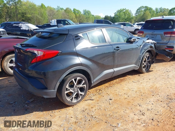 2019 Toyota C-HR XLE with VIN JTNKHMBX0K1023547, listed as a IAAI auction lot 41982484 with 119,533 mi miles and . Bid and sale history available at DreamBid. Image 4.