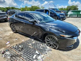 2022 Mazda 3 2.5 Turbo z VIN 3MZBPBAY9NM305244, wystawiony jako Copart lot #63661025 z przebiegiem 89 066 mil mil oraz Czysty tytuł • Clean title. Historia ofert i sprzedaży dostępna na DreamBid. Obrazek 4.