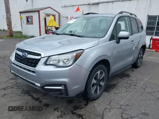 2018 Subaru Forester Premium with VIN JF2SJAGC3JH498940, listed as a IAAI auction lot 41880493 with 127,817 mi miles. Bid and sale history available at carsss.com. Image 2.