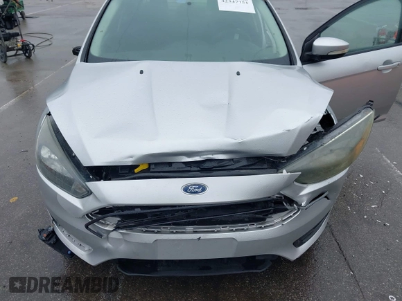 2017 Ford Focus SE with VIN 1FADP3FEXHL283329, listed as a IAAI auction lot 42347751 with 85,337 mi miles and . Bid and sale history available at DreamBid. Image 6.