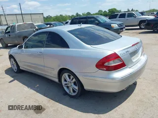 2007 Mercedes-Benz CLK 3.5L with VIN WDBTJ56H27F218970, listed as a IAAI auction lot 42054097 with 124,906 mi miles. Bid and sale history available at carsss.com. Image 3.