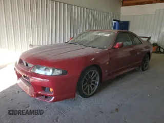 1997 Nissan Skyline z VIN BCNR33042682, wystawiony jako Copart lot #76562674 z przebiegiem 61 791 mil mil oraz Czysty tytuł • Clean title. Historia ofert i sprzedaży dostępna na DreamBid. Obrazek 1.