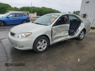 2004 Toyota Camry LE z VIN JTDBE32K940297754, wystawiony jako Copart lot #55809155 z przebiegiem 232 092 mil mil oraz Szkoda całkowita • Salvage title. Historia ofert i sprzedaży dostępna na DreamBid. Obrazek 1.