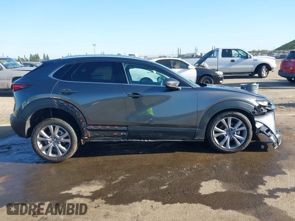 2022 Mazda CX-30 S Premium with VIN 3MVDMBDL0NM413867, listed as a IAAI auction lot 42082560 with 12,375 mi miles and . Bid and sale history available at DreamBid. Image 13.