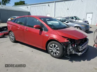 2021 Toyota Prius LE with VIN JTDKAMFP8M3179507, listed as a Copart auction lot 52571255 with 88,966 mi miles and Salvage Title. Bid and sale history available at DreamBid. Image 4.