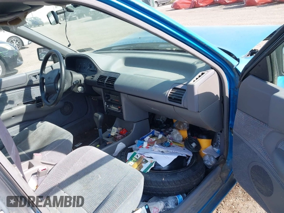 1994 Ford Escort z VIN 1FARP14J1RW244851, wystawiony jako IAAI lot #42157786 z przebiegiem 73 095 mil mil oraz . Historia ofert i sprzedaży dostępna na DreamBid. Obrazek 5.