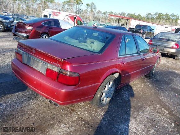 2003 Cadillac Seville Touring STS with VIN 1G6KY54983U212944, listed as a IAAI auction lot 41656796 with 118,662 mi miles. Bid and sale history available at carsss.com. Image 4.