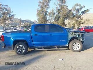 2021 Chevrolet Colorado 4WD Z71 with VIN 1GCGTDEN6M1264115, listed as a IAAI auction lot 41667276 with 31,304 mi miles and . Bid and sale history available at DreamBid. Image 14.