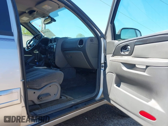 2004 GMC Envoy SLE with VIN 1GKDS13S242420100, listed as a IAAI auction lot 41963800 with 341,395 mi miles and . Bid and sale history available at DreamBid. Image 5.