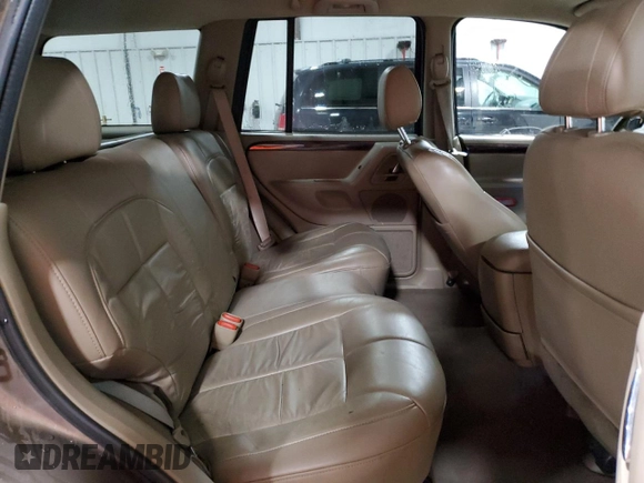 2002 Jeep Grand Cherokee Limited with VIN 1J4GW58NX2C248892, listed as a Copart auction lot 55574615 with 164,010 mi miles and Salvage title. Bid and sale history available at DreamBid. Image 11.