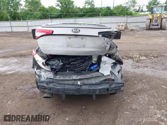 2013 Kia Optima SX z VIN 5XXGR4A65DG120332, wystawiony jako IAAI lot #42323216 z przebiegiem Nie podano mil oraz . Historia ofert i sprzedaży dostępna na DreamBid. Obrazek 16.