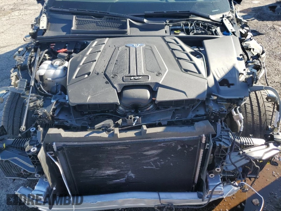 2022 Bentley Bentayga V8 z VIN SJAAM2ZV6NC016276, wystawiony jako Copart lot #39583644 z przebiegiem 5412 mil mil oraz . Historia ofert i sprzedaży dostępna na DreamBid. Obrazek 11.