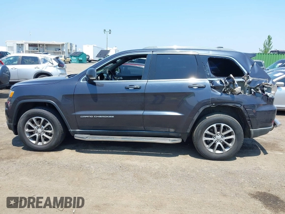 2014 Jeep Grand Cherokee Limited z VIN 1C4RJFBG7EC273458, wystawiony jako IAAI lot #42458515 z przebiegiem 161 090 mil mil oraz . Historia ofert i sprzedaży dostępna na DreamBid. Obrazek 14.