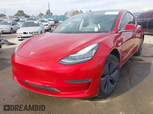 2020 Tesla Model 3 Standard Range Plus with VIN 5YJ3E1EA9LF718027, listed as a IAAI auction lot 41679320 with 68,987 mi miles. Bid and sale history available at carsss.com. Image 17.