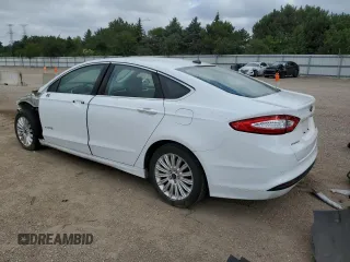 2016 Ford Fusion SE Hybrid with VIN 3FA6P0LUXGR184285, listed as a Copart auction lot 62699805 with 132,264 mi miles and Salvage title. Bid and sale history available at DreamBid. Image 2.