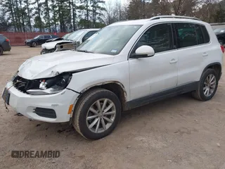 2017 Volkswagen Tiguan Wolfsburg Edition with VIN WVGRV7AX5HK019734, listed as a IAAI auction lot 41391911 with 123,005 mi miles and . Bid and sale history available at DreamBid. Image 17.