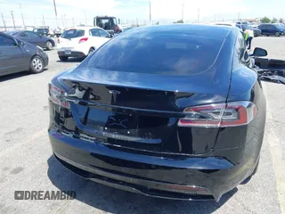 2022 Tesla Model S with VIN 5YJSA1E51NF464231, listed as a IAAI auction lot 42077838 with 53,290 mi miles and . Bid and sale history available at DreamBid. Image 17.