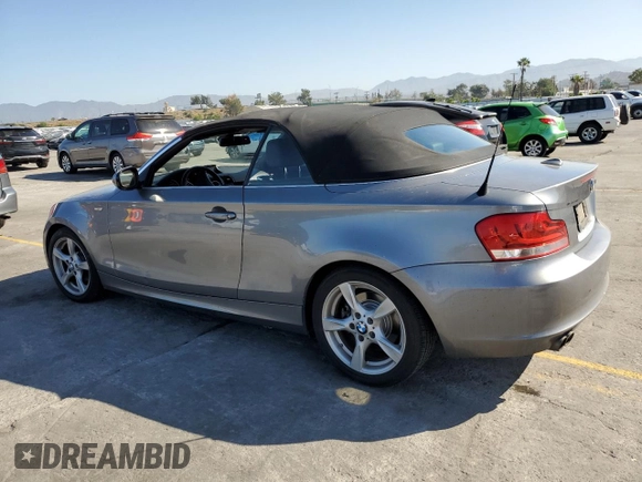 2012 BMW 1 Series 128i with VIN WBAUN1C5XCVR00151, listed as a Copart auction lot 56040445 with 171,302 mi miles and Salvage title. Bid and sale history available at DreamBid. Image 2.