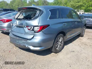 2019 Infiniti QX60 Luxe with VIN 5N1DL0MM7KC567051, listed as a IAAI auction lot 42065874 with 112,379 mi miles and . Bid and sale history available at DreamBid. Image 4.
