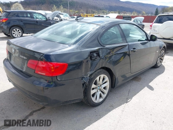 2011 BMW 3 Series 328i xDrive with VIN WBAKF5C55BE586564, listed as a IAAI auction lot 41944192 with 153,167 mi miles. Bid and sale history available at carsss.com. Image 6.