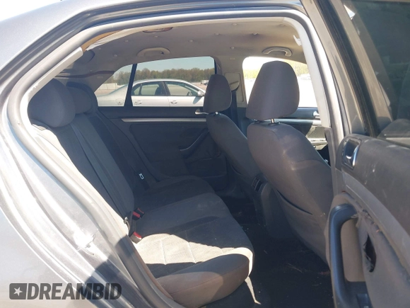 2009 Volkswagen Jetta S with VIN 3VWJZ71K49M075892, listed as a IAAI auction lot 42097445 with 218,016 mi miles and . Bid and sale history available at DreamBid. Image 8.