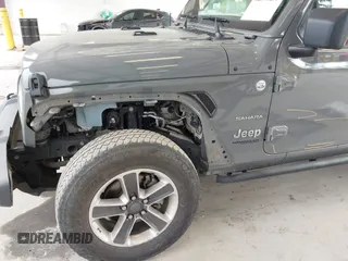 2019 Jeep Wrangler Unlimited Sahara with VIN 1C4HJXEN0KW540591, listed as a IAAI auction lot 42076235 with 41,016 mi miles and . Bid and sale history available at DreamBid. Image 6.