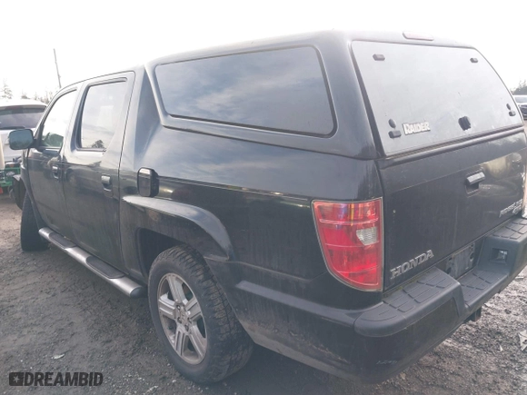 2011 Honda Ridgeline RTL with VIN 5FPYK1F5XBB454788, listed as a IAAI auction lot 41501881 with 171,481 mi miles. Bid and sale history available at carsss.com. Image 3.