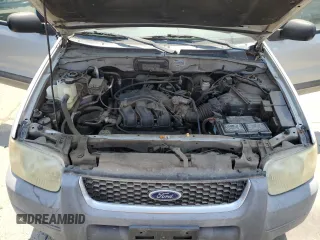 2002 Ford Escape XLT z VIN 1FMCU03152KC58829, wystawiony jako Copart lot #61541644 z przebiegiem Nie podano mil oraz Czysty tytuł • Clean title. Historia ofert i sprzedaży dostępna na DreamBid. Obrazek 12.