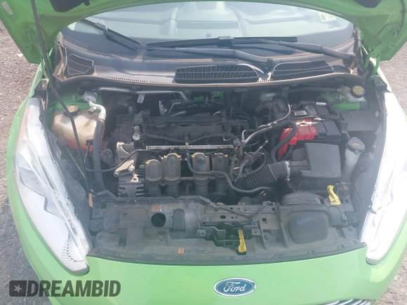 2014 Ford Fiesta Titanium z VIN 3FADP4FJXEM226724, wystawiony jako IAAI lot #42427106 z przebiegiem 63 302 mil mil oraz . Historia ofert i sprzedaży dostępna na DreamBid. Obrazek 10.