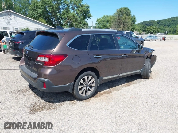 2019 Subaru Outback Touring with VIN 4S4BSATC7K3246765, listed as a IAAI auction lot 42793821 with 57,110 mi miles and . Bid and sale history available at DreamBid. Image 4.