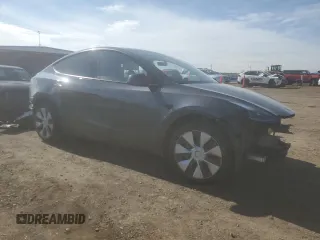 2023 Tesla Model Y Long Range z VIN 7SAYGDEE7PF965446, wystawiony jako Copart lot #54710375 z przebiegiem 23 807 mil mil oraz Szkoda całkowita • Salvage title. Historia ofert i sprzedaży dostępna na DreamBid. Obrazek 4.