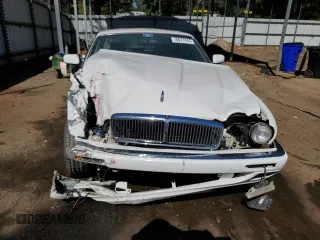 1996 Jaguar XJ with VIN SAJHX1747TC767829, listed as a Copart auction lot 76677444 with Not provided miles and Salvage title. Bid and sale history available at DreamBid. Image 5.