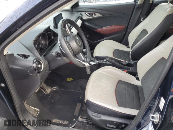 2018 Mazda CX-3 Grand Touring z VIN JM1DKFD73J0309811, wystawiony jako Copart lot #50003315 z przebiegiem 135 365 mil mil oraz Czysty tytuł • Clean title. Historia ofert i sprzedaży dostępna na DreamBid. Obrazek 7.