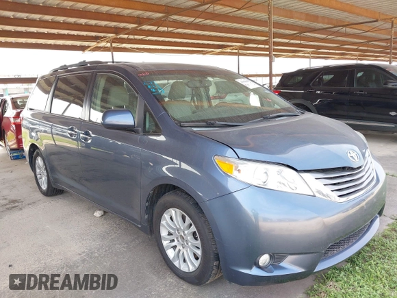 2015 Toyota Sienna XLE with VIN 5TDYK3DC7FS618571, listed as a IAAI auction lot 41930199 with 49,516 mi miles and . Bid and sale history available at carsss.com. Image 1.
