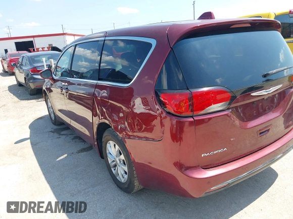 2019 Chrysler Pacifica Touring Plus z VIN 2C4RC1FGXKR706264, wystawiony jako IAAI lot #42416570 z przebiegiem 86 897 mil mil oraz . Historia ofert i sprzedaży dostępna na DreamBid. Obrazek 3.