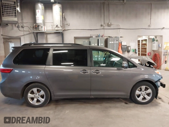 2015 Toyota Sienna LE AAS with VIN 5TDKK3DC6FS652281, listed as a IAAI auction lot 41891750 with 150,162 mi miles. Bid and sale history available at carsss.com. Image 13.