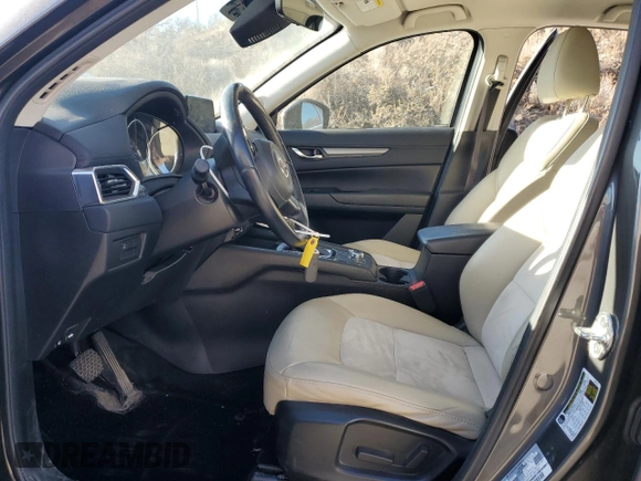 2017 Mazda CX-5 Touring with VIN JM3KFBCL2H0204097, listed as a Copart auction lot 88173195 with 76,884 mi miles and Salvage Title. Bid and sale history available at carsss.com. Image 7.