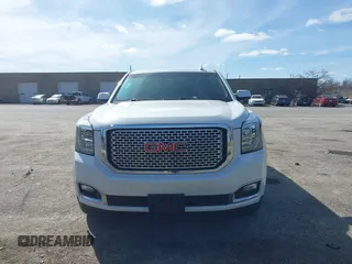 2017 GMC Yukon Denali with VIN 1GKS2CKJ4HR148397, listed as a IAAI auction lot 41942659 with 167,719 mi miles. Bid and sale history available at carsss.com. Image 12.