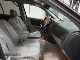 2005 Cadillac SRX with VIN 1GYEE63A550155188, listed as a IAAI auction lot 41442286 with 168,882 mi miles. Bid and sale history available at carsss.com. Image 5.