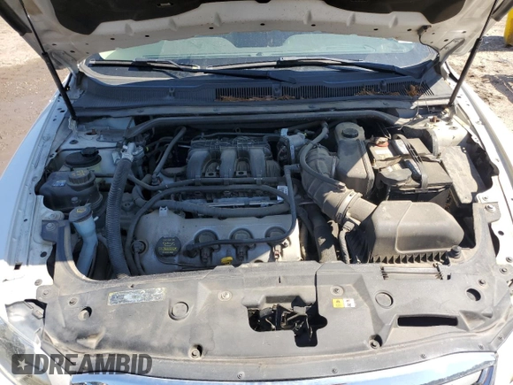 2011 Ford Taurus Limited with VIN 1FAHP2FW8BG141839, listed as a Copart auction lot 56594285 with 121,236 mi miles and Salvage title. Bid and sale history available at DreamBid. Image 11.