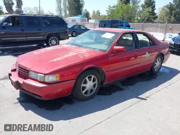 1996 Cadillac Seville Touring STS with VIN 1G6KY5290TU835414, listed as a IAAI auction lot 42051767 with 185,798 mi miles. Bid and sale history available at carsss.com. Image 2.