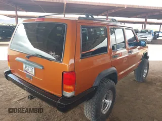 1997 Jeep Cherokee Sport with VIN 1J4FJ68SXVL517077, listed as a IAAI auction lot 42350553 with Not provided miles and . Bid and sale history available at DreamBid. Image 4.