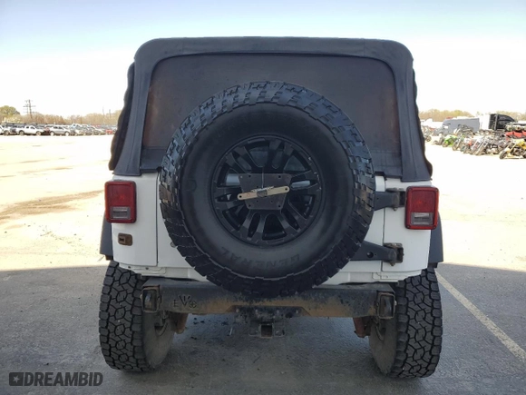 2015 Jeep Wrangler Unlimited Sport with VIN 1C4BJWDG1FL541324, listed as a Copart auction lot 51953635 with 133,070 mi miles and Clean Title. Bid and sale history available at carsss.com. Image 6.