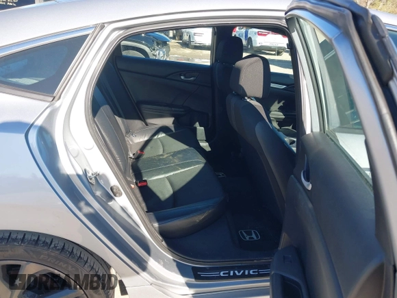 2019 Honda Civic Sport with VIN 2HGFC2F8XKH602463, listed as a IAAI auction lot 41966052 with 95,416 mi miles and . Bid and sale history available at DreamBid. Image 8.