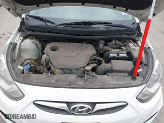 2012 Hyundai Accent GS with VIN KMHCT5AE4CU051716, listed as a IAAI auction lot 41692287 with 173,861 mi miles. Bid and sale history available at carsss.com. Image 10.