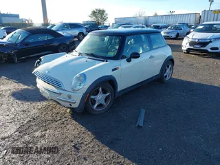 2004 MINI Hardtop with VIN WMWRC33464TJ58388, listed as a IAAI auction lot 40827409 with 102,322 mi miles and . Bid and sale history available at DreamBid. Image 17.